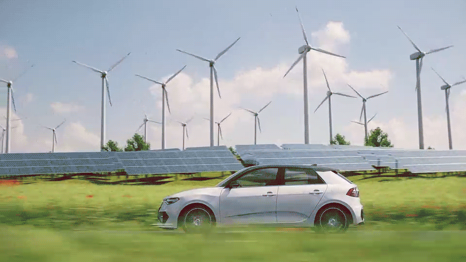 太陽光発電と風力発電を背景に走る電気自動車